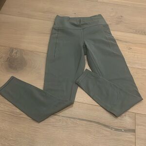 ATHLETA transcend high rise stash tight